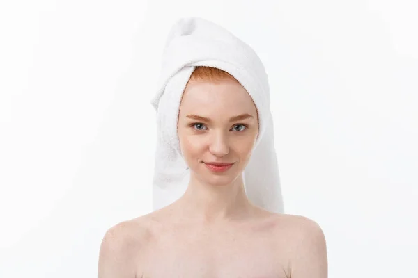 Surprised Beautiful Young Woman After Bath with A Towel On Her Head Isolated On white Background. Skin Care And Spa Theme. — Stock Photo, Image
