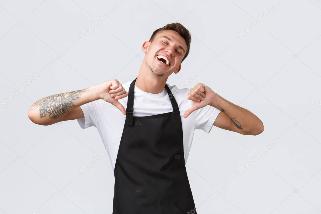 Employees, grocery stores and coffee shop concept. Handsome happy and pleased barista, waiter become employee of month, pointing at himself proud and delighted, white background