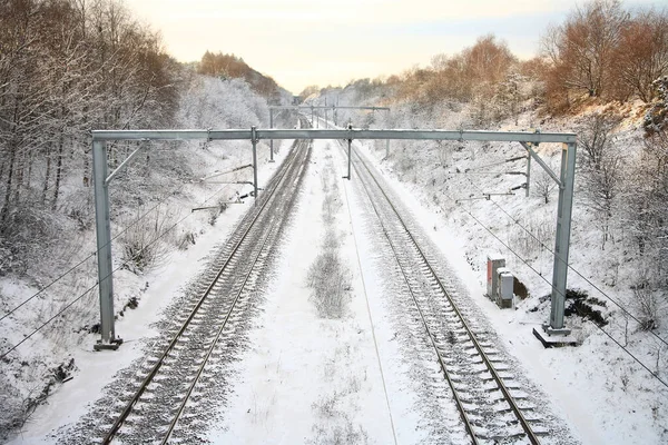 snow covered train tracks