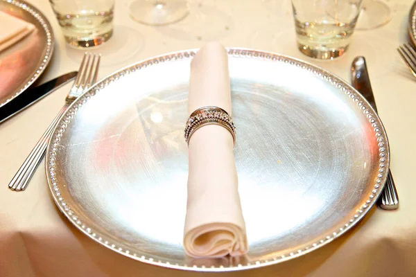 silver plate with napkin