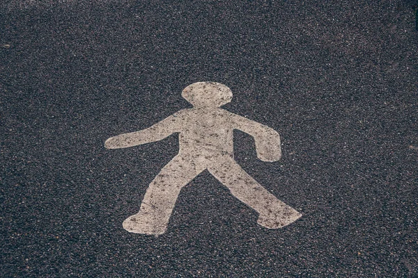 Signage character on the road — Stock Photo, Image