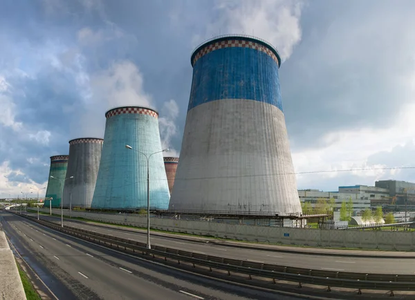 Cooling towers of a thermal power plant on a sunny summer day.