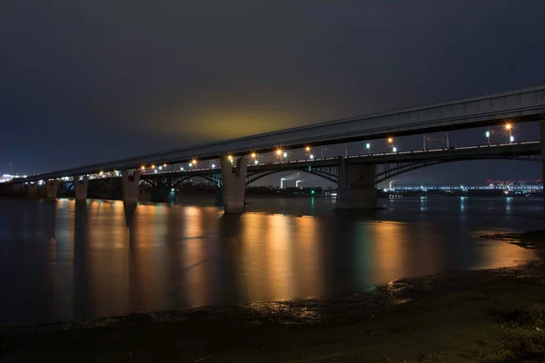 The bridge in the Night Novosibirsk. — Stock Image Bridge Night Novosibirsk Royalty Free Stock Photos