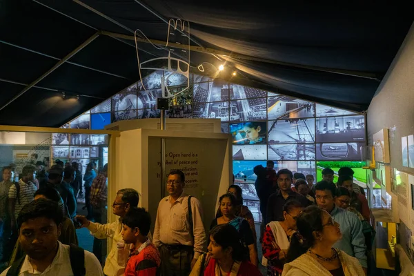 KOLKATA, INDIA - FEBRUARY 9TH , 2018 : Customers inside a colorful bookstall at book fair. It is world's largest, most attended and famous non-trade book fair.