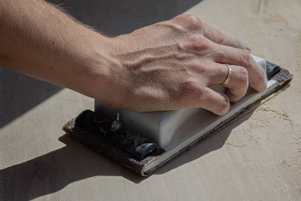 Man Hand Polishing Untreated Wooden Surface — Stock Photo, Image
