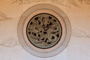 Çin motifleri, ham madde olan taş oymalar. Taş oyma ejderha bulut ve Çin stili