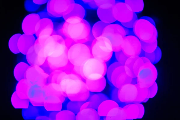 Colorful purple bokeh abstract background. ark purple bokeh background. abstract blurred lights. Abstract blurred purple background with bokeh effect. Abstract purple elegant blurred bokeh background