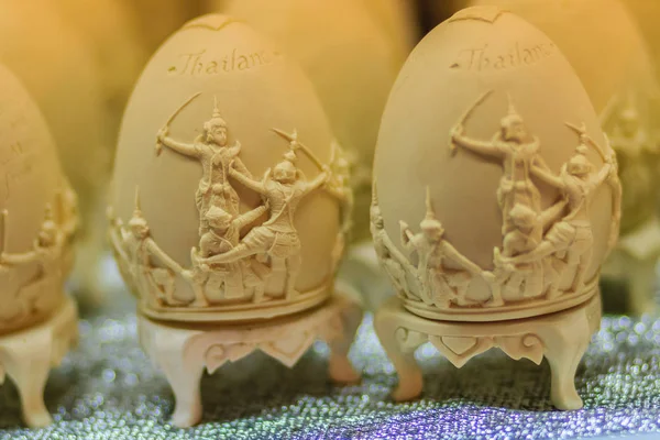 Beautiful Ester egg with Thai pattern. Handwriting inscription Happy Easter in Thai Style patterns.