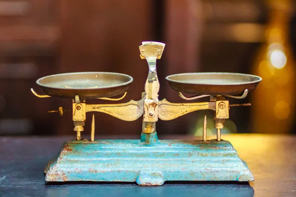 Old Golden weighing scale balance, Ancient old scale, Vintage old brass weight scale for people who like to collect the antique objects.