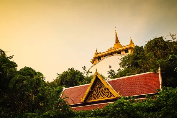 Beautiful view of Wat Saket Ratcha Wora Maha Wihan (Wat Phu Khao Thong, Golden Mount temple), a popular Bangkok tourist attraction and has become one of the symbols of the city.