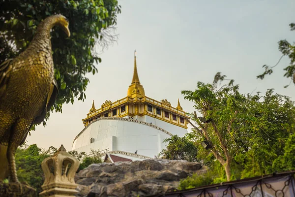 Beautiful peacock sculpture at front of Wat Saket Ratcha Wora Maha Wihan (Wat Phu Khao Thong, Golden Mount temple), a popular Bangkok tourist attraction and has become one of the symbols of the city.