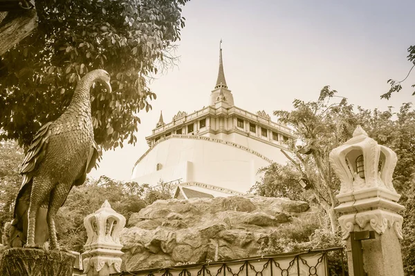 Beautiful peacock sculpture at front of Wat Saket Ratcha Wora Maha Wihan (Wat Phu Khao Thong, Golden Mount temple), a popular Bangkok tourist attraction and has become one of the symbols of the city.