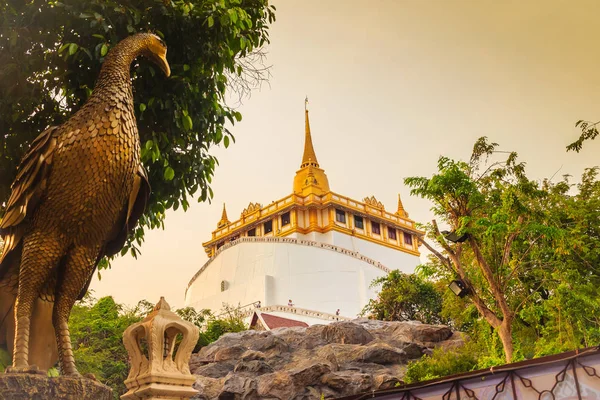 Beautiful peacock sculpture at front of Wat Saket Ratcha Wora Maha Wihan (Wat Phu Khao Thong, Golden Mount temple), a popular Bangkok tourist attraction and has become one of the symbols of the city.