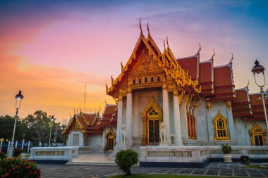Beautiful landscape and architectural of Wat Benchamabophit Dusitvanaram, also known as the marble temple, it is one of Bangkok's most beautiful temples and a major tourist attraction. clipart