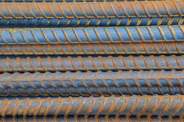 Rusty Barlar takviye beton arka plan için deforme. Bina inşaat için çelik veya deforme bar malzeme yeniden paslı bar.