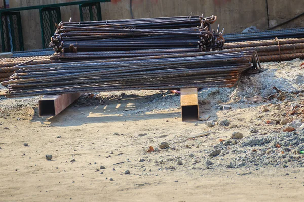 Bent deformed steel bars ready for reinforced concrete work. Cut and bent steel bars prepared for reinforcing concrete.