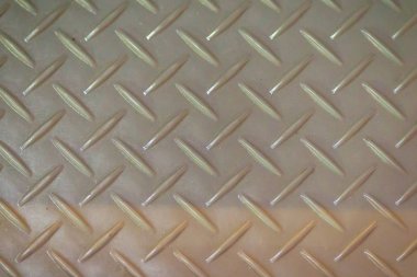 Paslı çelik elmas plaka doku arka plan. Aşınmış metal katında Dikişsiz çelik sac metal. Elmas desenli sorunsuz metal zemin plakası.