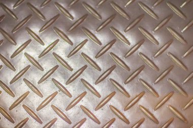 Paslı çelik elmas plaka doku arka plan. Aşınmış metal katında Dikişsiz çelik sac metal. Elmas desenli sorunsuz metal zemin plakası.