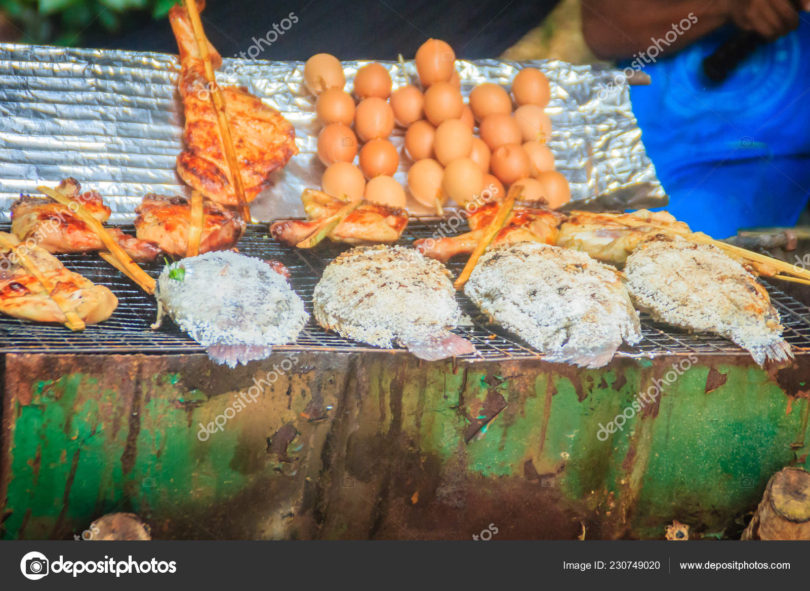 Salt Coated Tilapia Fish Grilled Charcoal Stove Grilled Chicken