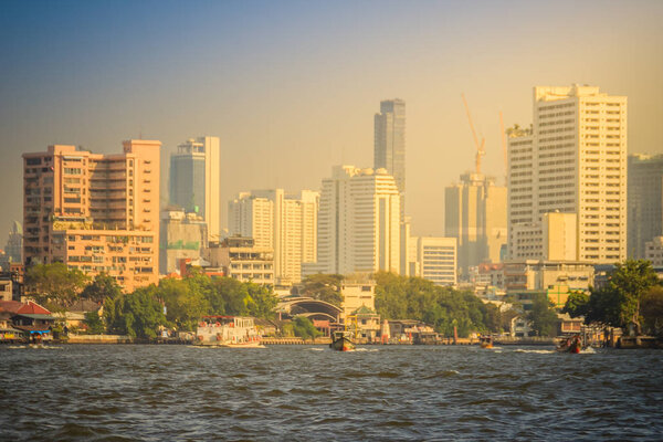 Beautiful Bangkok downtown cityscape view from Chao Phraya River. Bangkok is the capital and most populous city of the Kingdom of Thailand, the world's top tourist destinations.