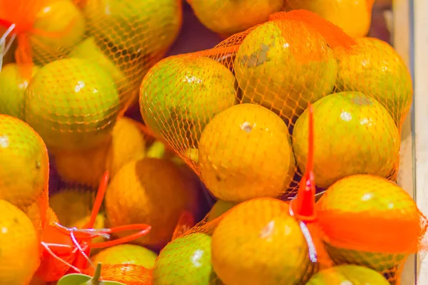 Fresh Organic Juicy Oranges Fruit Plastic Net Bag Sale Fruit — Stock Photo, Image