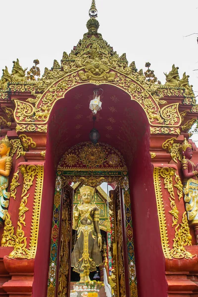Beautiful art of Buddha image, religious places and religious objects in Myanmar mixed with Lanna style at Wat Ming Muang Buddhist temple, Chiang Rai, Thailand. Mixed Lanna and Burmese arts.