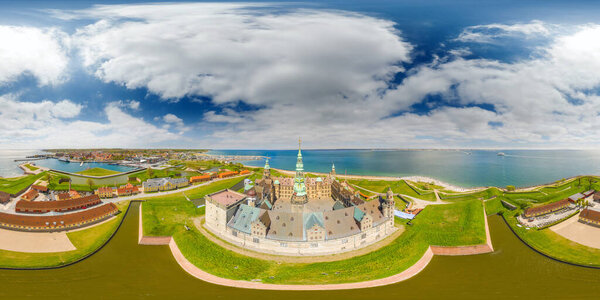 An aerial drone view of the Kronborg  castle stronghold in the town of Helsingr, Denmark. One of the most important Renaissance castles in Northern Europe. 360 degrees panorama