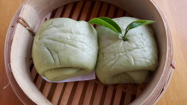 A top view of jasmine tea and steamed buns that people like to eat.