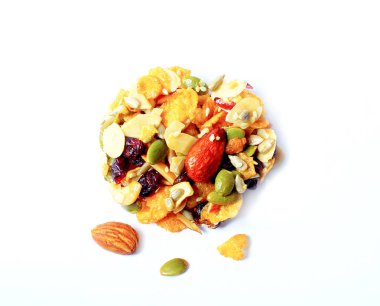 Ev yapımı mısır gevreği ve arka planda kurabiyeler..