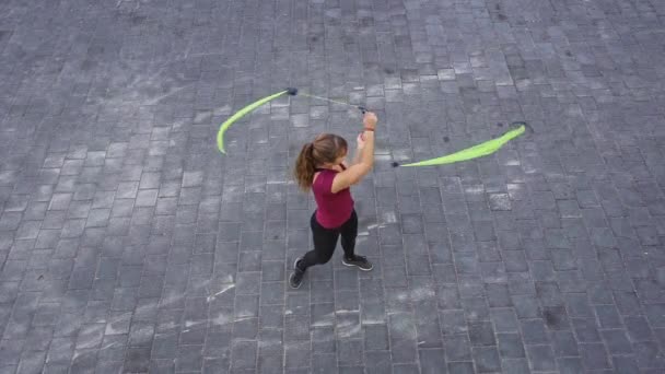 Female Teenager Swinging Bands Urban Scenery — Stock Video