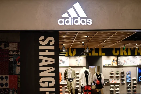 Facade Adidas Store Illuminated Shop Sign Blur Background — Stock Photo, Image