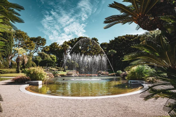 A beautiful retro colored garden and fountain of Villa Ephrussi de Rothschild on a sunny day