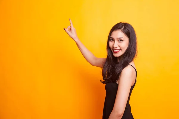 Back Asian Woman Touching Screen Her Finger Yellow Background — Stock Photo, Image