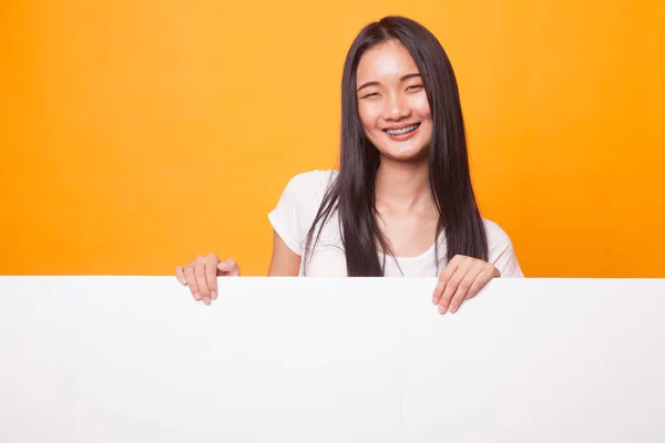 Young Asian Woman Blank Sign Bright Yellow Background — Stock Photo, Image