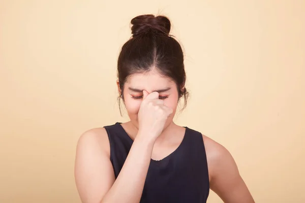 Young Asian Woman Got Sick Headache Beige Background — Stock Photo, Image