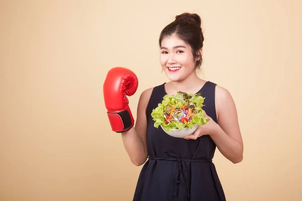 Young Asian Woman Boxing Glove Salad Beige Background — Stock Photo, Image