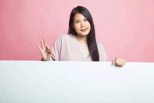 Joven Mujer Asiática Muestran Con Signo Blanco Sobre Fondo Rosa —  Fotos de Stock