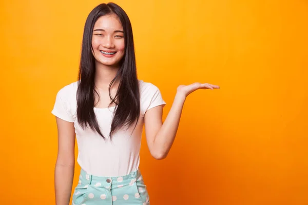 Beautiful Young Asian Woman Show Palm Hand Bright Yellow Background — Stock Photo, Image