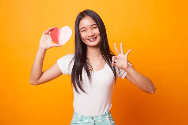 Asian Woman Show Red Heart Bright Yellow Background — Stock Photo, Image