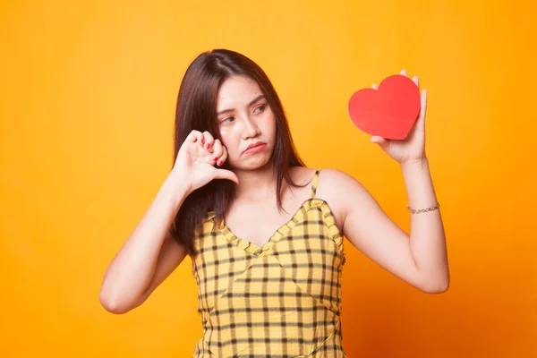 Asian Woman Thumbs Red Heart Yellow Background — Stock Photo, Image