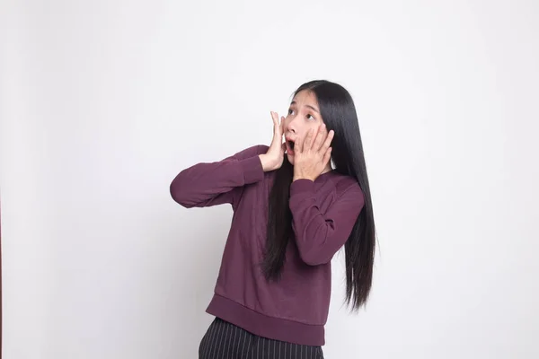 Beautiful young Asian woman shocked  and look up. — Stock Photo, Image