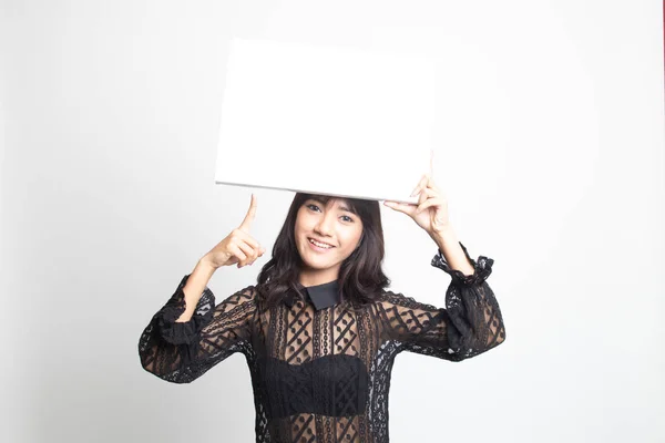 Jeune asiatique femme point à vide signe . — Photo