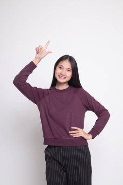 Genç Asyalı kadın gülümseme ve noktası.