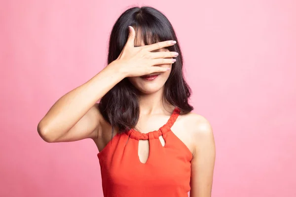 Young Asian woman close her eyes with hand. — Stock Photo, Image