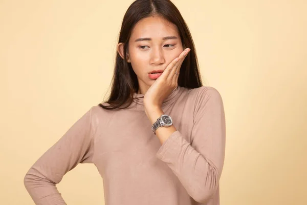 Young Asian woman got toothache.