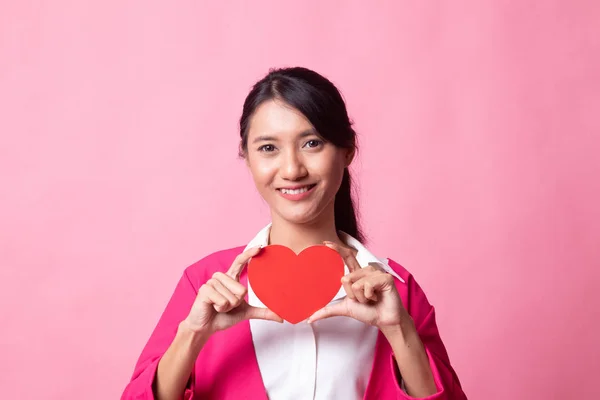 Asian woman with red heart. — Stock Photo, Image