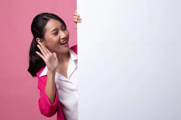 Excited young Asian woman with blank sign. — Stock Photo, Image