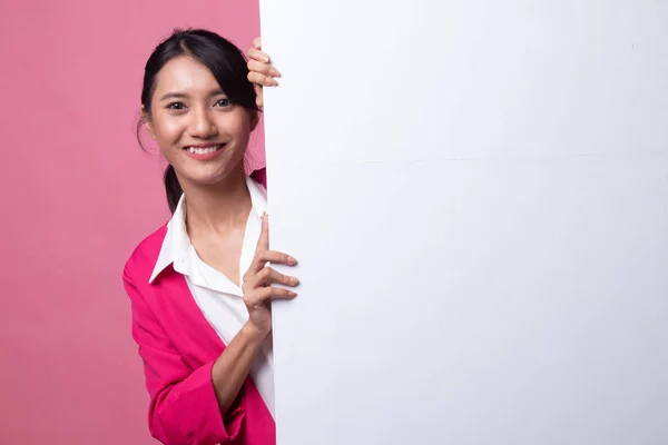 Young Asian woman with blank sign. — Stock Photo, Image