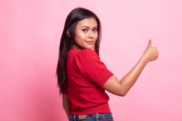 Fiatal ázsiai nő visszafordulni thumbs up. — Stock Fotó