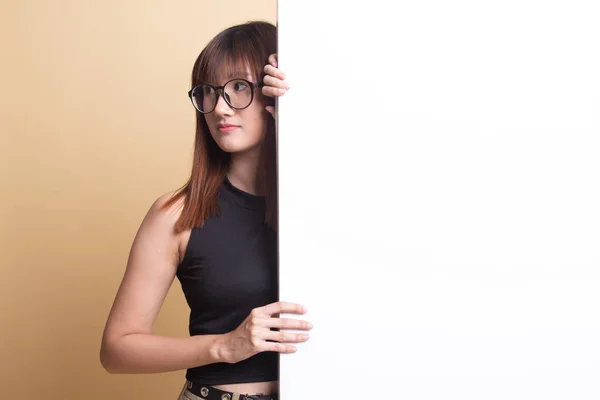 Young Asian woman with blank sign. — Stock Photo, Image